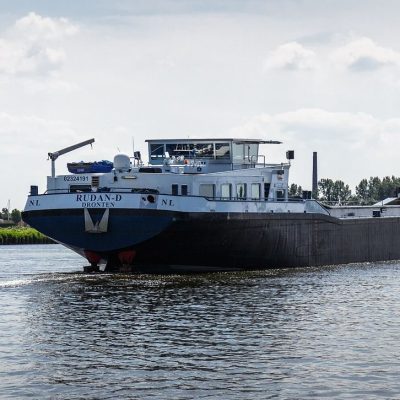 A cargo ship navigating icy northern waters