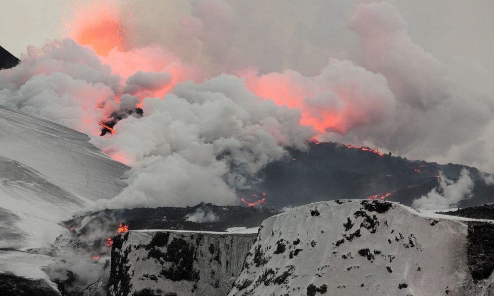 A volcanic landscape with rising steam in Iceland