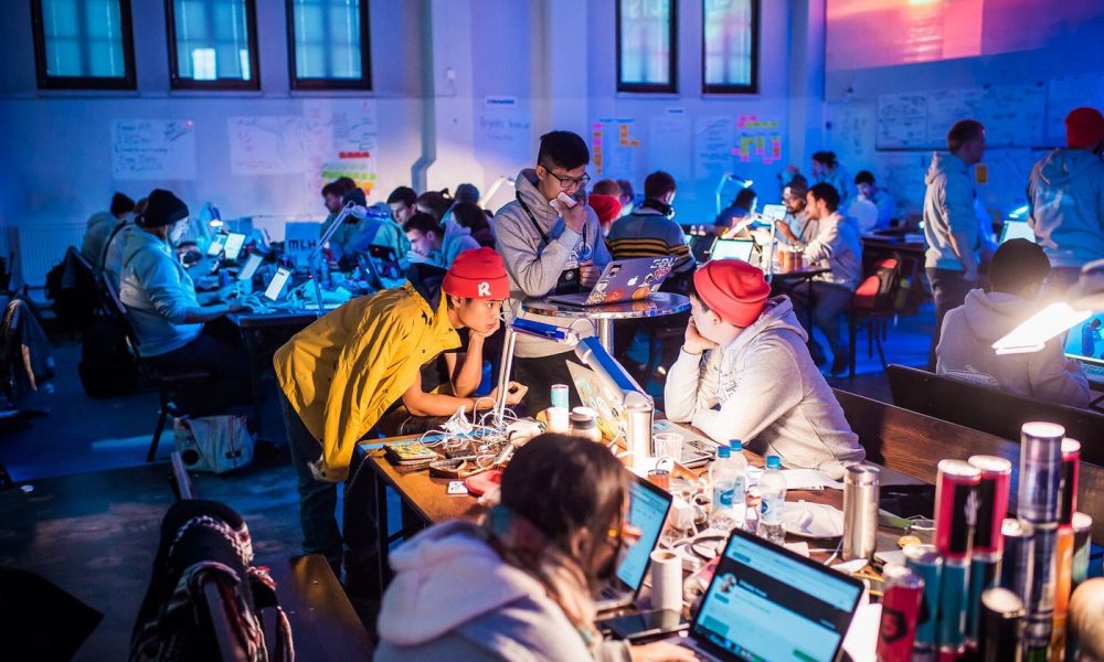 software developers reviewing open source code together