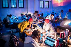 software developers reviewing open source code together