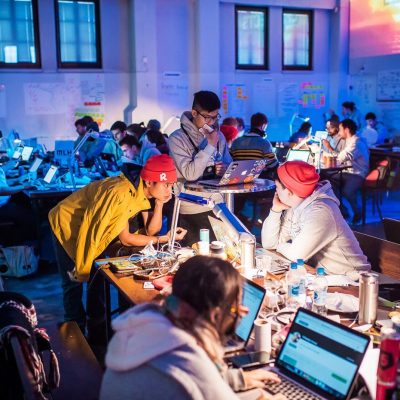 software developers reviewing open source code together
