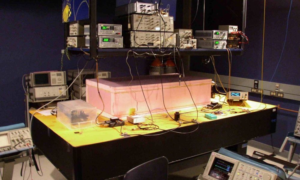scientist working with quantum sensor equipment in a laboratory