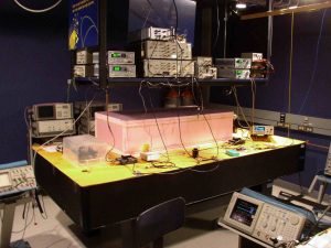 scientist working with quantum sensor equipment in a laboratory